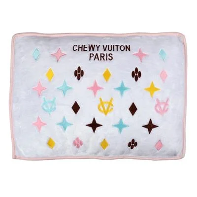  . **Cat nest winter warmth**White Chewy Vuiton Bed